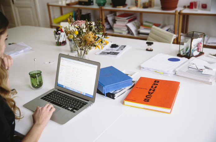 Side view of girl walking with pregnant mother